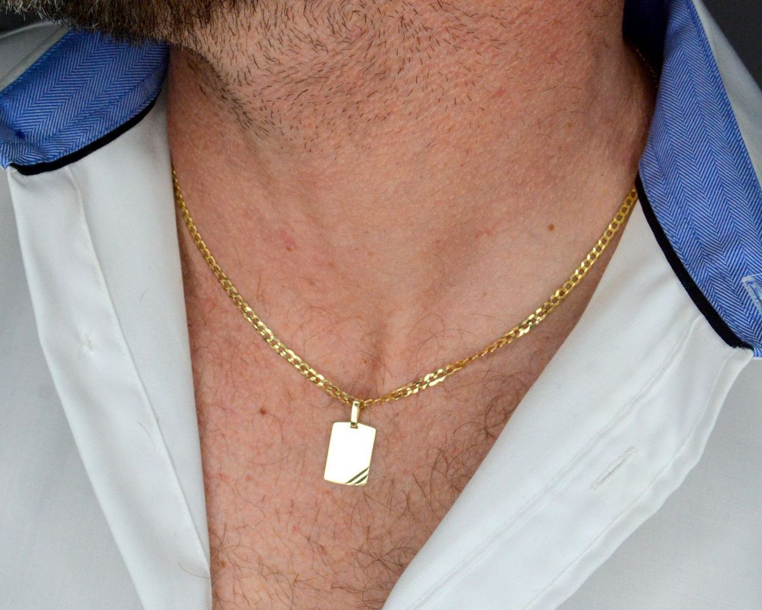 Złota zawieszka 375 gładka blaszka nieśmiertelnik ZA 6359B 375 Wisiorek został wykonany z wysokiej jakości złota próby 375. Złoto to jeden z najpopularniejszych kruszców, cenione przez kobiety na całym świecie1.jpg